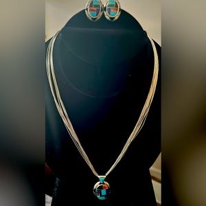 Signed Carolyn Pollack set